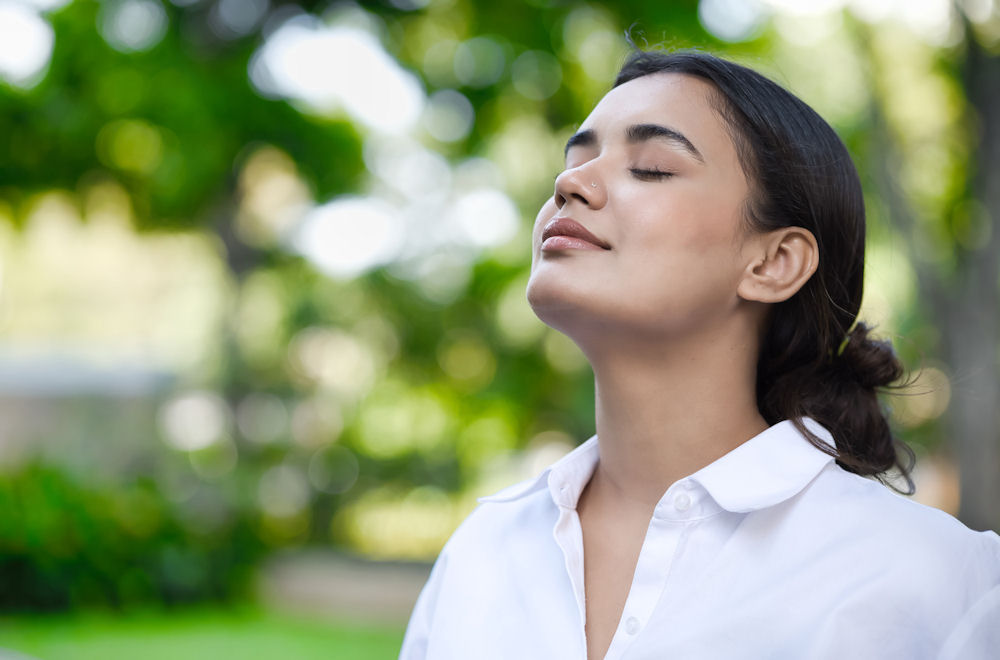 woman in recovery outside feeling relief