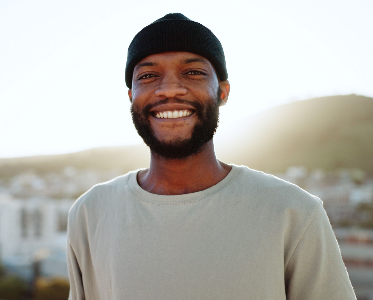 man in recovery smiling