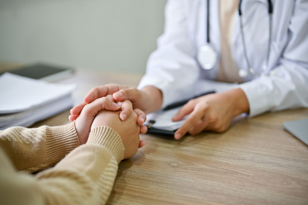 healthcare professional meeting with client