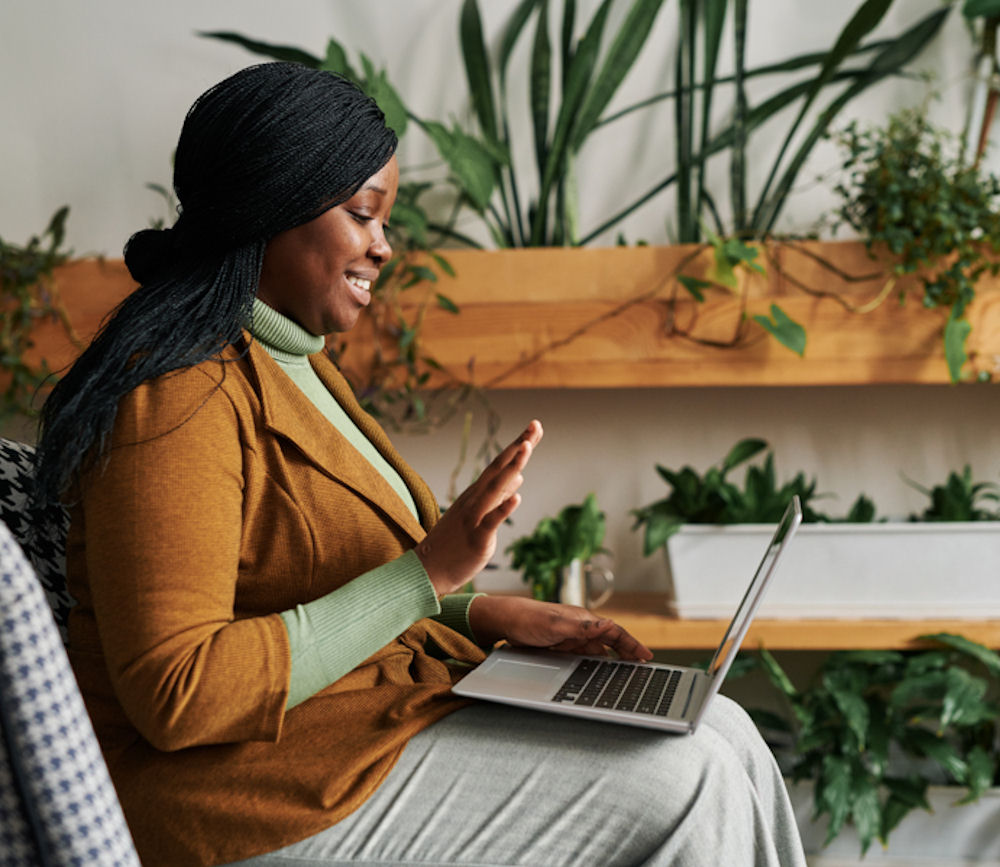 woman using laptop for telehealth